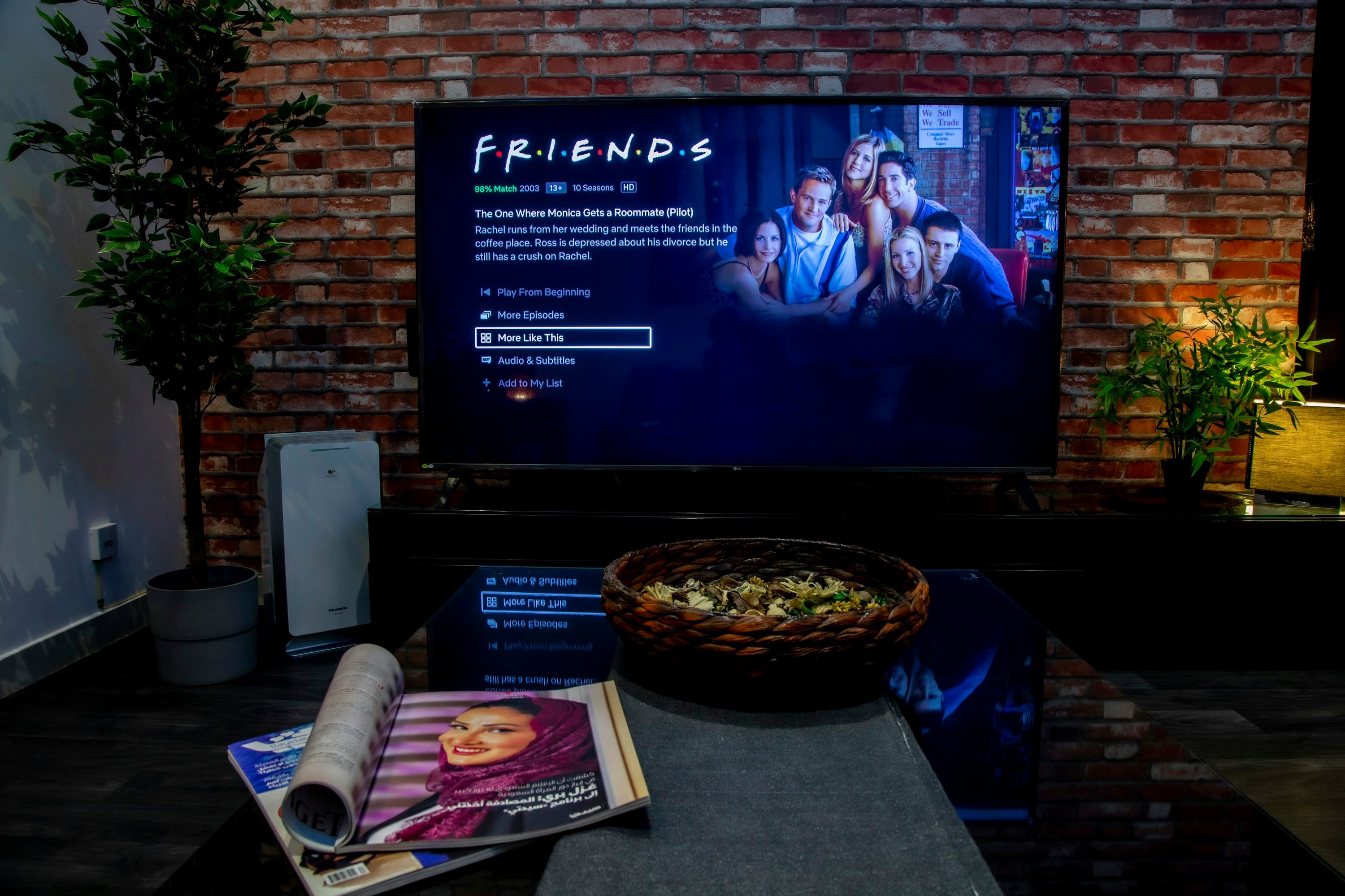 Family relaxing and watching streaming content through an IPTV player with Xtream Codes API