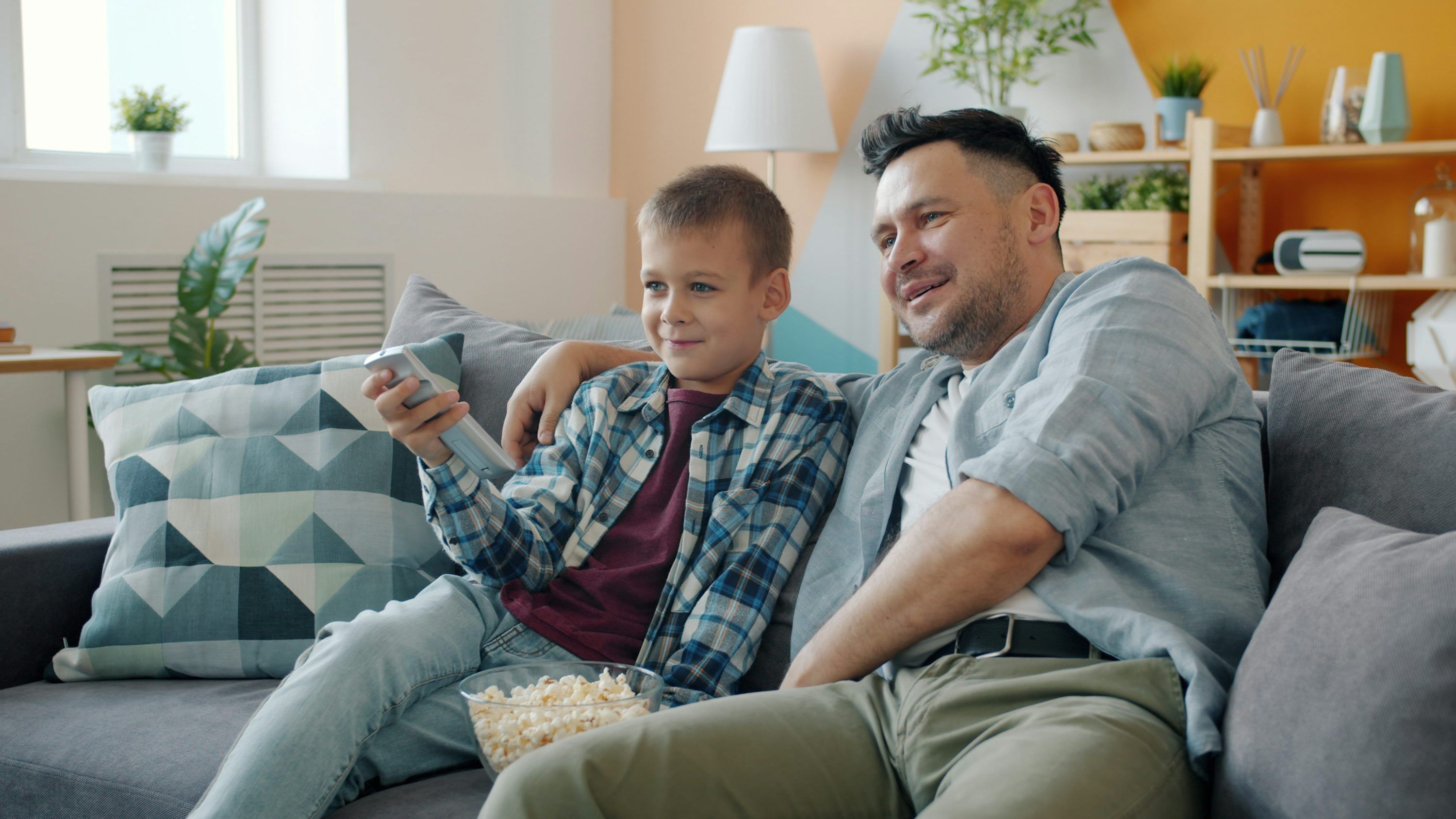 Happy family streaming live TV and VOD content using Kyro Player Xtream Codes API connection
