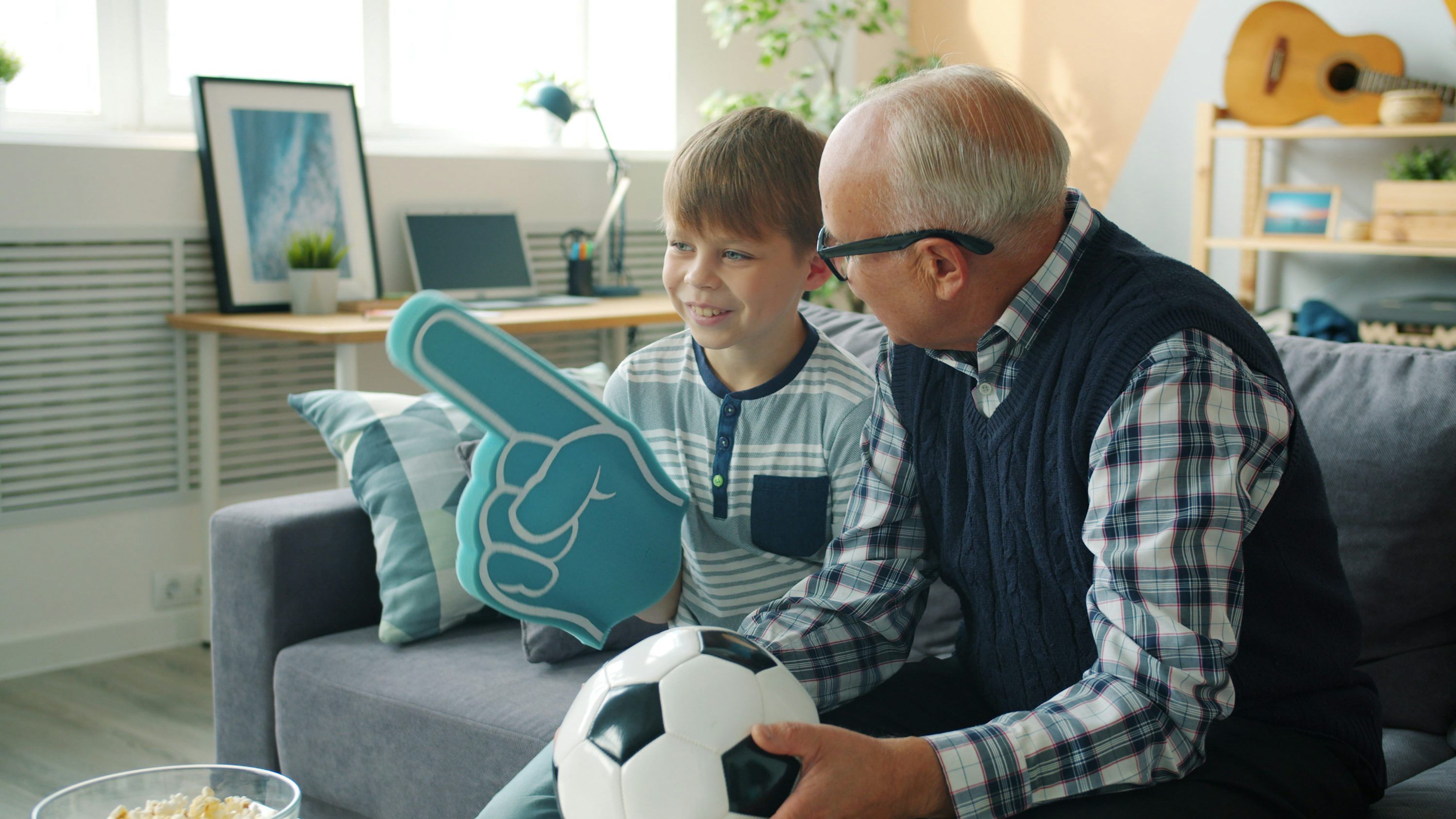 Family enjoying premium IPTV streaming with Kyro Player on a home television setup