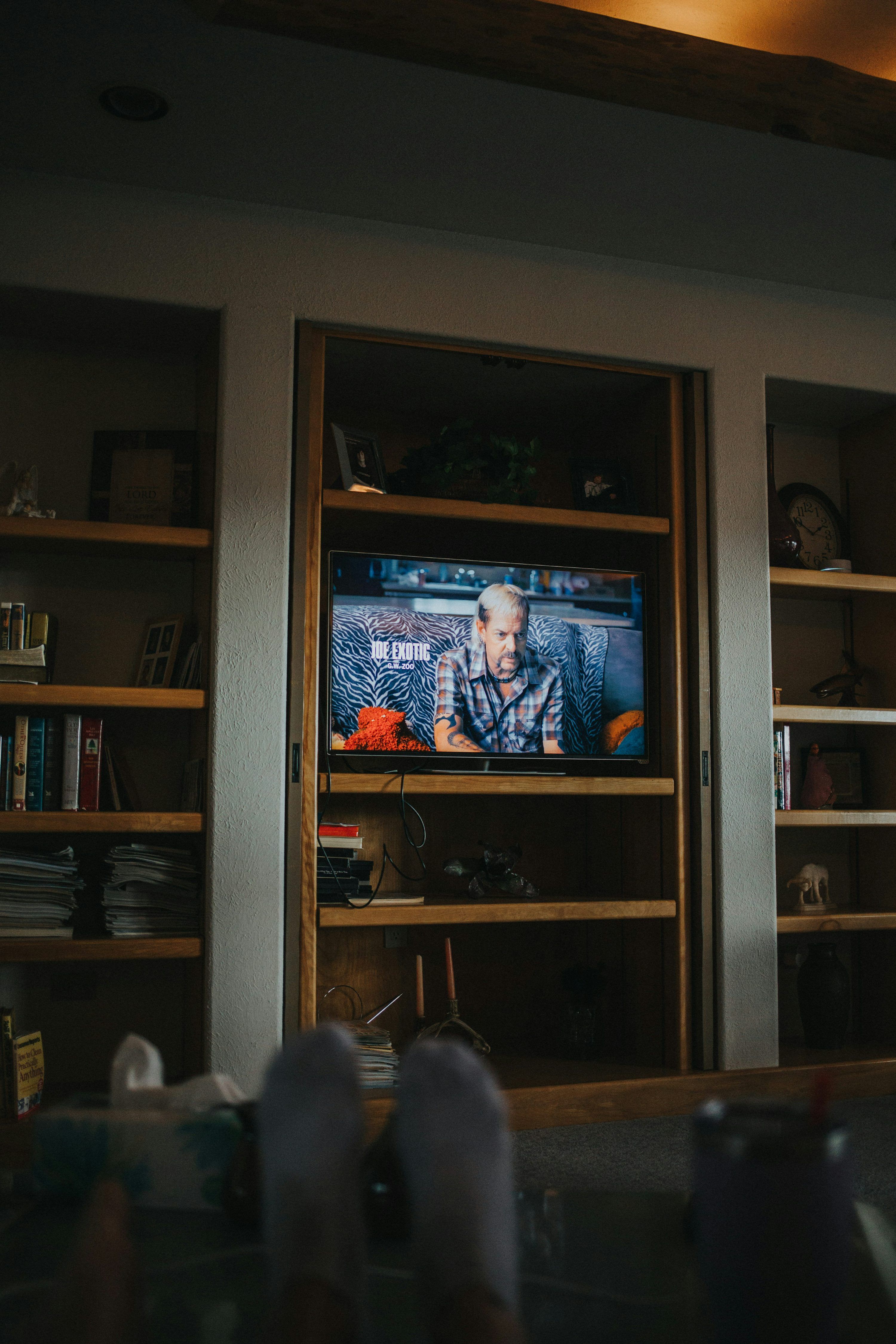 Couple watching content on a smart TV using a playlist-based media player app